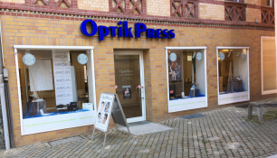Firmenansicht von „Optik Press“